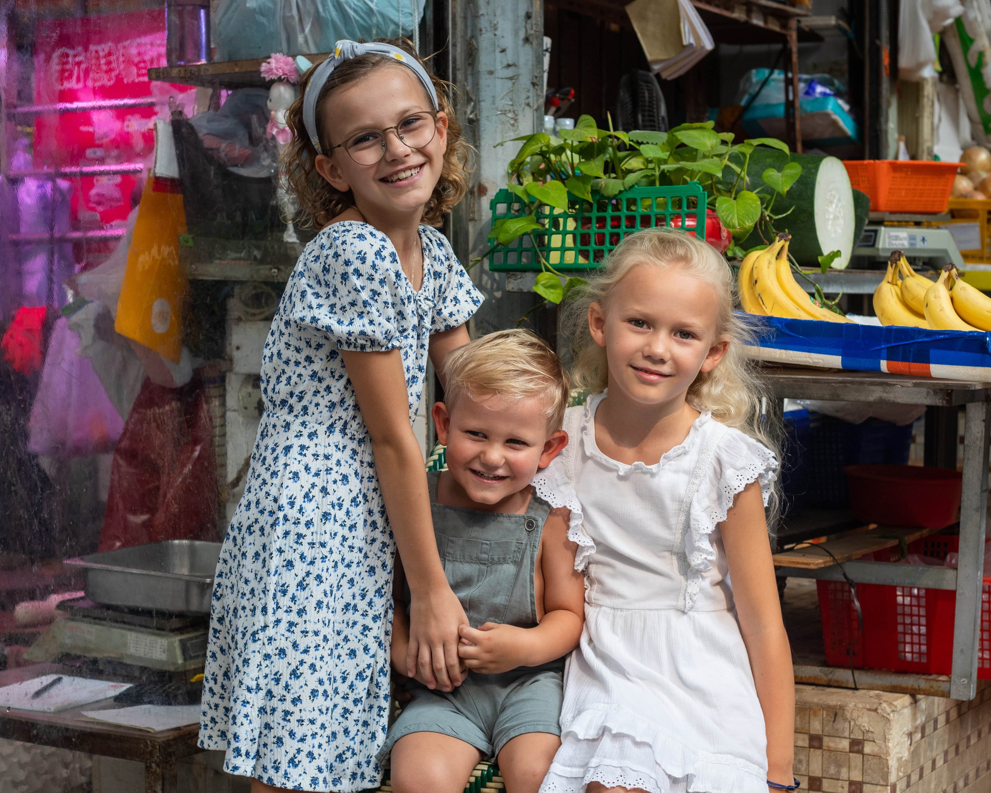 3 dutch kids in the wet market in central Hong Kong.