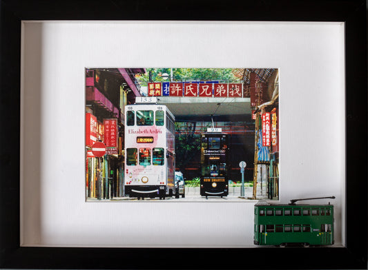 Hong Kong tram framed with a miniature Hong Kong tramways tram.