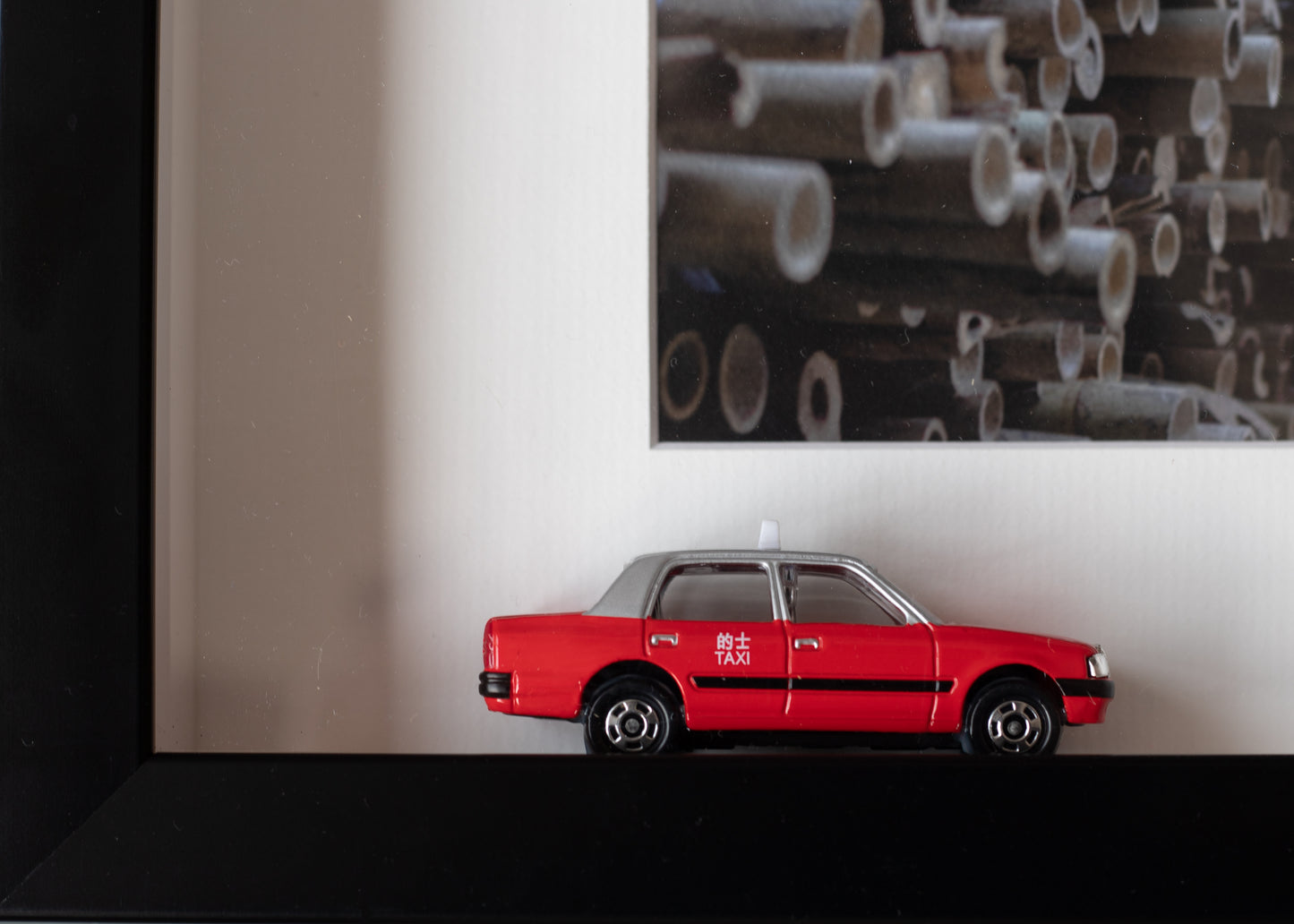 Close up view of the Mini red hong kong taxi